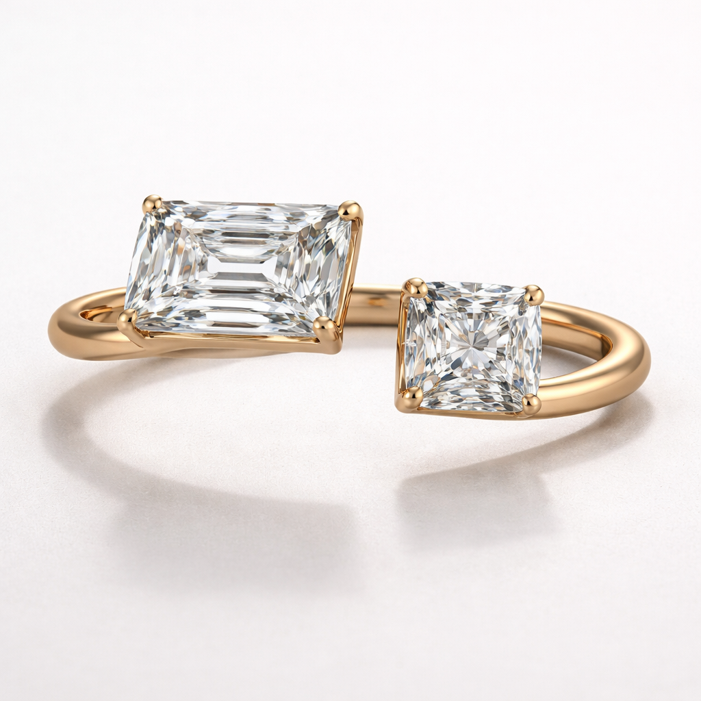 A bespoke, architectural two-stone diamond ring with real negative space. The ring features a dominant 2.30 carat cut-cornered rectangular modified brilliant diamond (approximately 8.33 x 6.75 mm) and a smaller 1.40 carat cushion modified brilliant diamond (approximately 6.33 x 6.10 mm). The size difference is clearly visible and proportional. The stones are asymmetrical, independently set, and separated by a small but deliberate gap of negative space. They do not touch and do not share a setting. The shank is slim (about 1.8–2.0 mm) but sculpted and load-bearing, with subtle asymmetry. Medium profile height. Warm precious metal. Minimal, modern, engineered aesthetic. No pavé, no vintage, no romantic styling. Emphasis on structural realism and physical credibility.