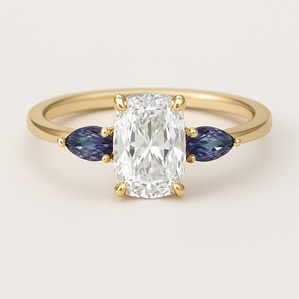 2 carat elongated cushion cut diamond engagement ring with double claw prongs in yellow gold ring with marquise shaped alexandrite side stones