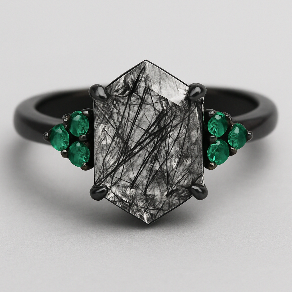 Black band, medium long hexagon cut rutilated black quartz, emerald accent stones 3 on each side in a cluster 
