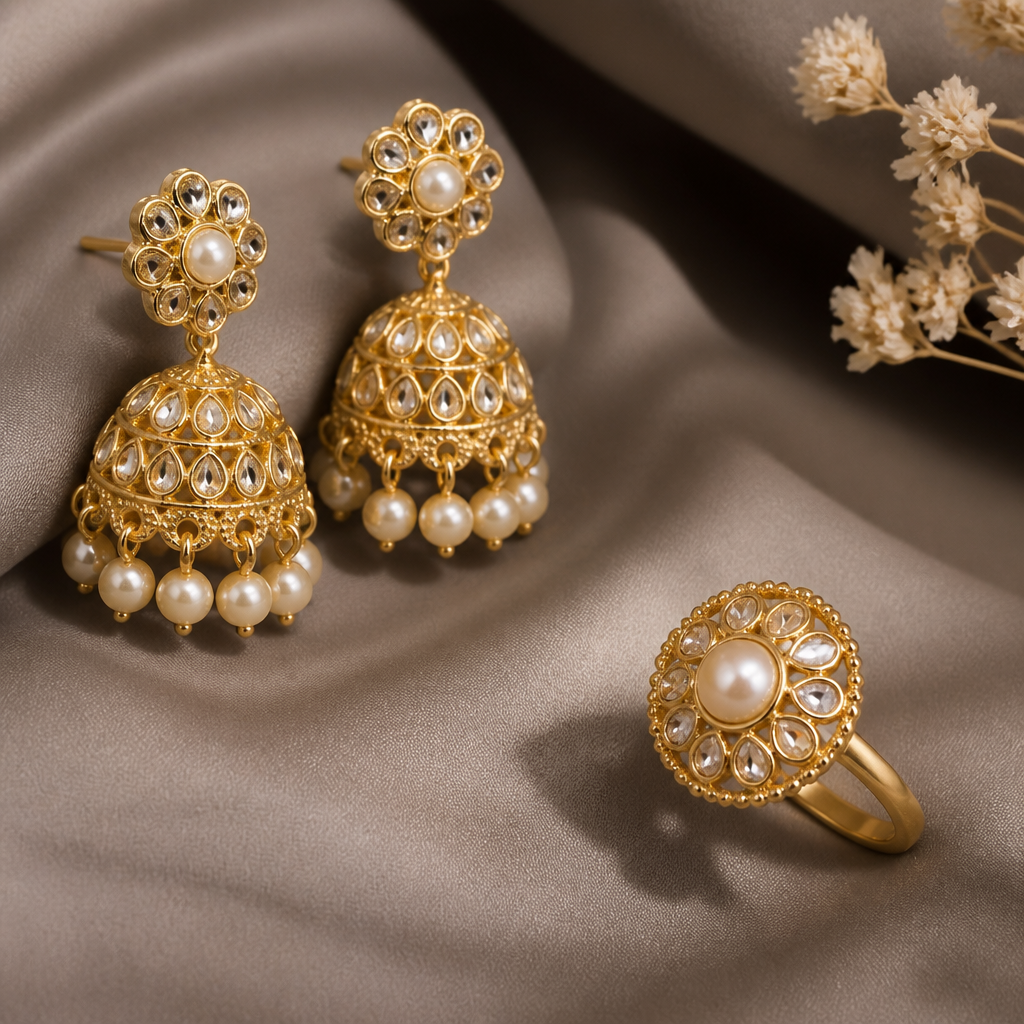 A classic women's ring made of gold with pearl stones suitable for festival. kempt set jhumka