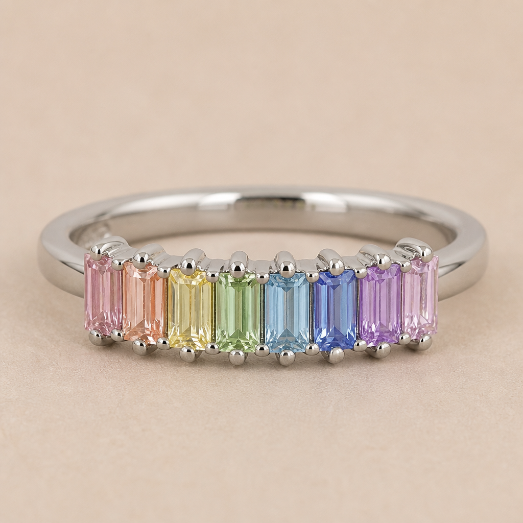 A minimalist women's ring made of white gold with sapphire stones. 8 pastel rainbow sapphires in baquette cut
photorealistic jewelry design, A minimalist women's ring made of white gold with sapphire stones. 8 pastel rainbow sapphires in baquette cut, minimalist style, just the design no text