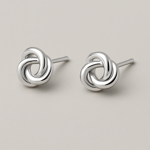 "Love's Knot" Stud Earrings: Elegant sterling silver stud earrings in the shape of a perfectly formed, simple love knot. No stones, just the beautiful, symbolic intertwining of silver.