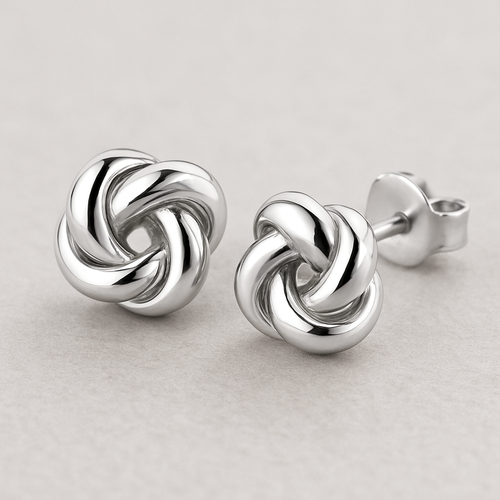 "Love's Knot" Stud Earrings: Elegant sterling silver stud earrings in the shape of a perfectly formed, simple love knot. No stones, just the beautiful, symbolic intertwining of silver.