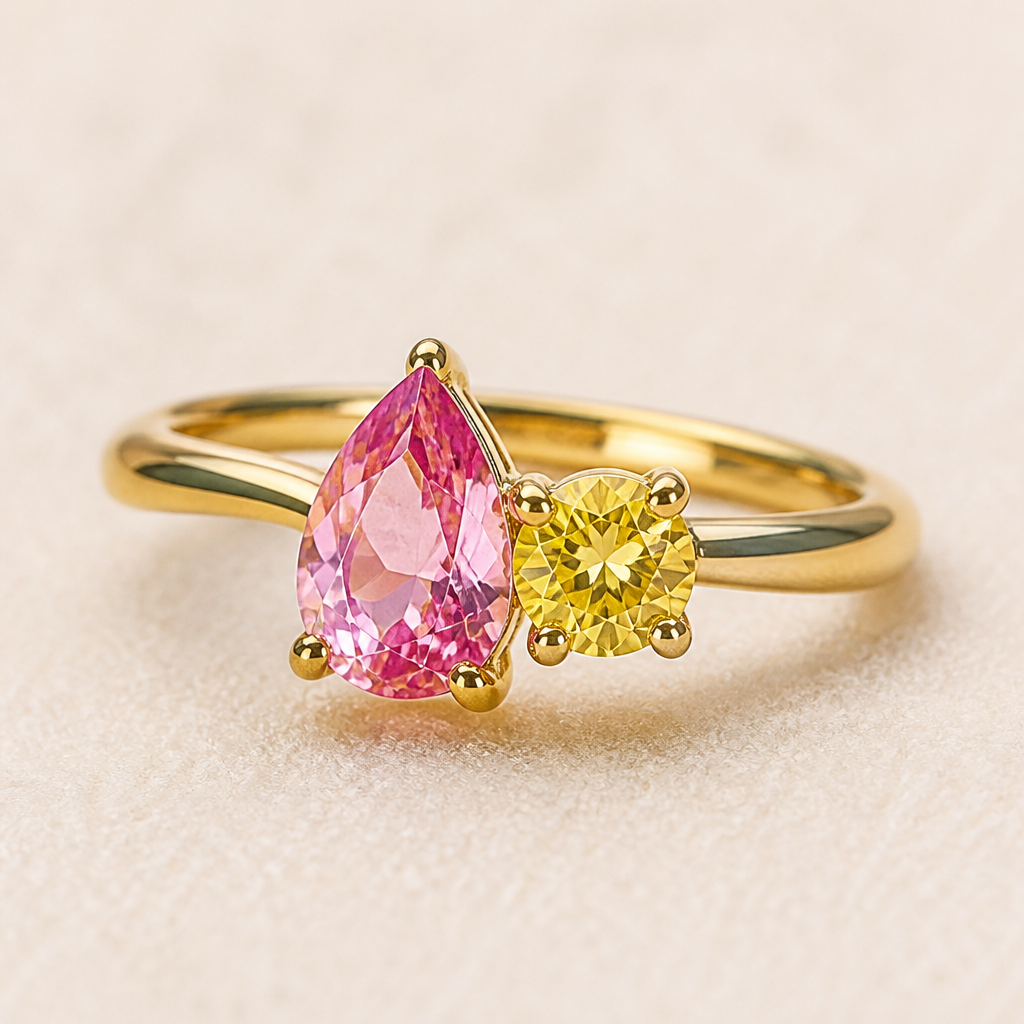 A classic women's ring made of gold with diamond and sapphire stones suitable for birthday. anello con Zaffiro rosa taglio goccia e accanto zaffiro giallo taglio tondo montato su oro giallo. (modello toi e moi)
photorealistic jewelry design, A classic women's ring made of gold with diamond and sapphire stones suitable for birthday. anello con Zaffiro rosa taglio goccia e accanto zaffiro giallo taglio tondo montato su oro giallo. (modello toi e moi), classic style, just the design no text