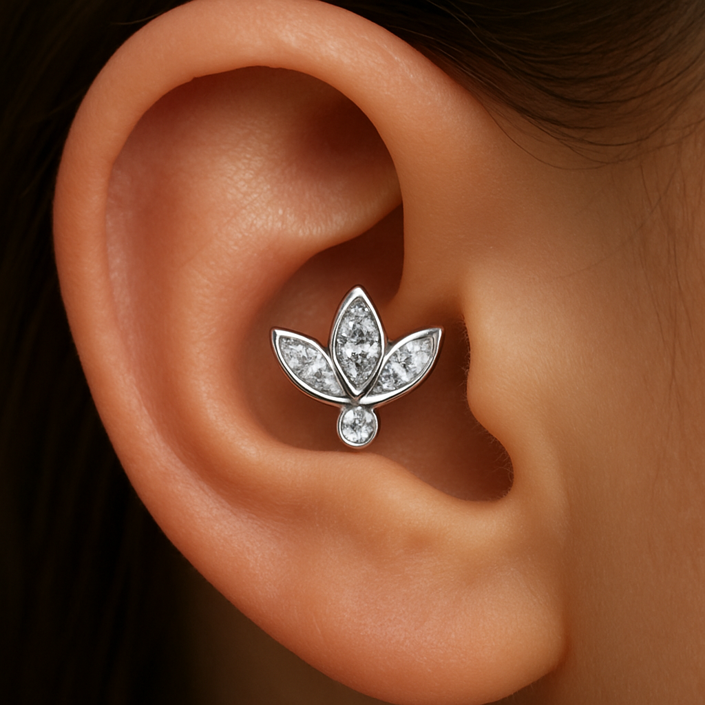 it is 14K white gold piercing jewelry with brilliants. the placement of piercing - helix (ear cartilage). the shape of the jewelry is lotus with 3 leaves (marquises) with small tiny round diamond below.