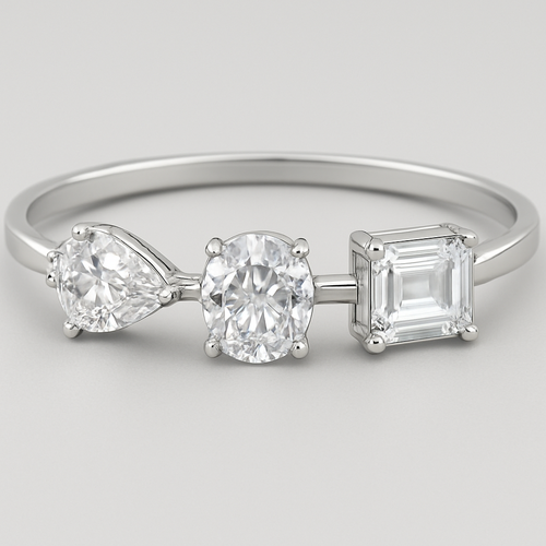Diamonds in pear cut,  oval cut and emerald cut joined one after another as a bracelet in a silver setting