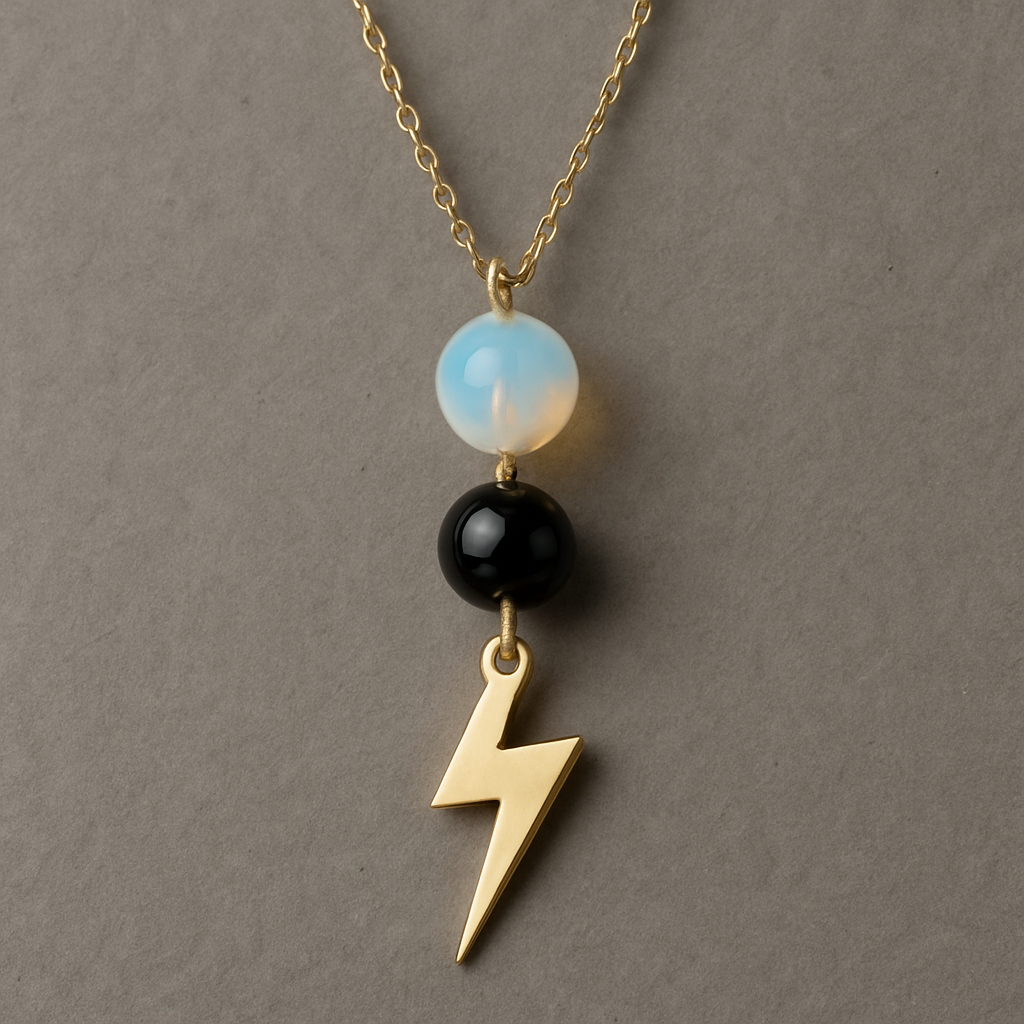 Opalite and onyx necklace with a gold lightening strike pendent