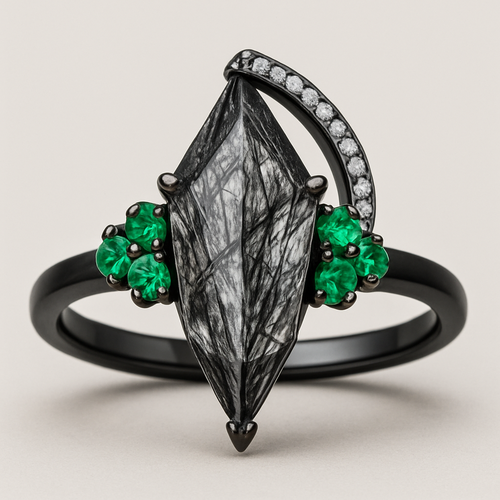 Black band, long kite cut rutilated black quartz, emerald accent stones 3 on each side in a cluster, add a wedding band that curves around the top of the main stone with black and white stones