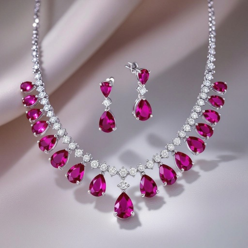 Ruby luxury necklace long pear drop style and luxury earring set Platinum necklace, ruby pear drops, diamond accents, prong setting. Matching platinum earrings, ruby pear drops, diamond accents, prong setting.