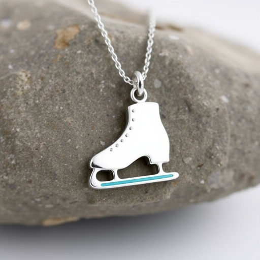 Silver Pendant shape one ice skate with turquoise stripe inside the low thin part blade