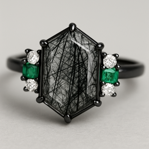 Skinny medium length Hexagon cut Black rutilated quartz with 1 emerald on each side and 2 moissanite on each side accent stones in a cluster on a black band