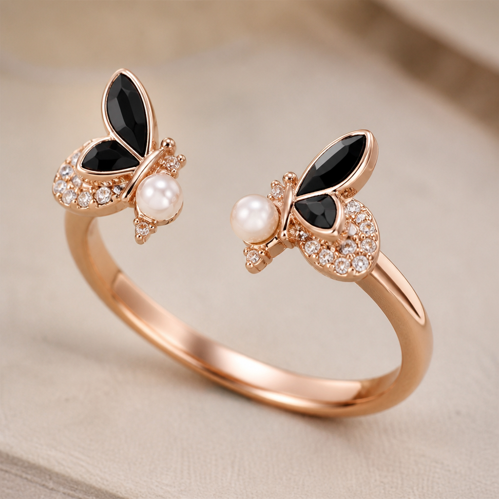 A classic women's ring made of rose gold with diamond and pearl stones. A butterfly of black stone of one wing at one end and another wing at another wing and ther should be gap between them
photorealistic jewelry design, A classic women's ring made of rose gold with diamond and pearl stones. A butterfly of black stone of one wing at one end and another wing at another wing and ther should be gap between them, classic style, just the design no text
