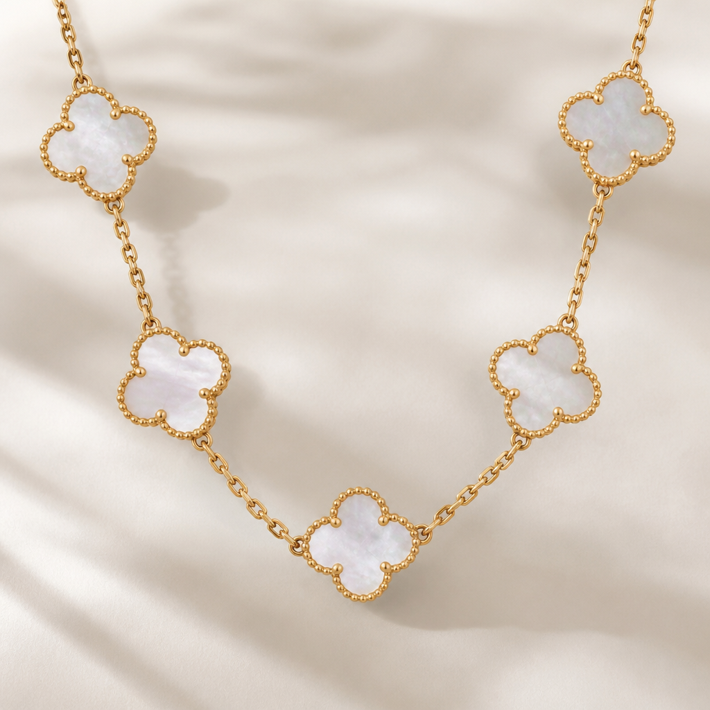 Same design like the one before but make it look like van cleef jewelry
photorealistic jewelry design, Same design like the one before but make it look like van cleef jewelry , just the design no text