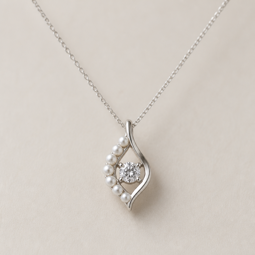 A minimalist women's pendant made of white gold with pearl stones suitable for daily wear. a diamond pendent with told designing around it with a thin minimalist silver chain
photorealistic jewelry design, A minimalist women's pendant made of white gold with pearl stones suitable for daily wear. a diamond pendent with told designing around it with a thin minimalist silver chain, minimalist style, just the design no text