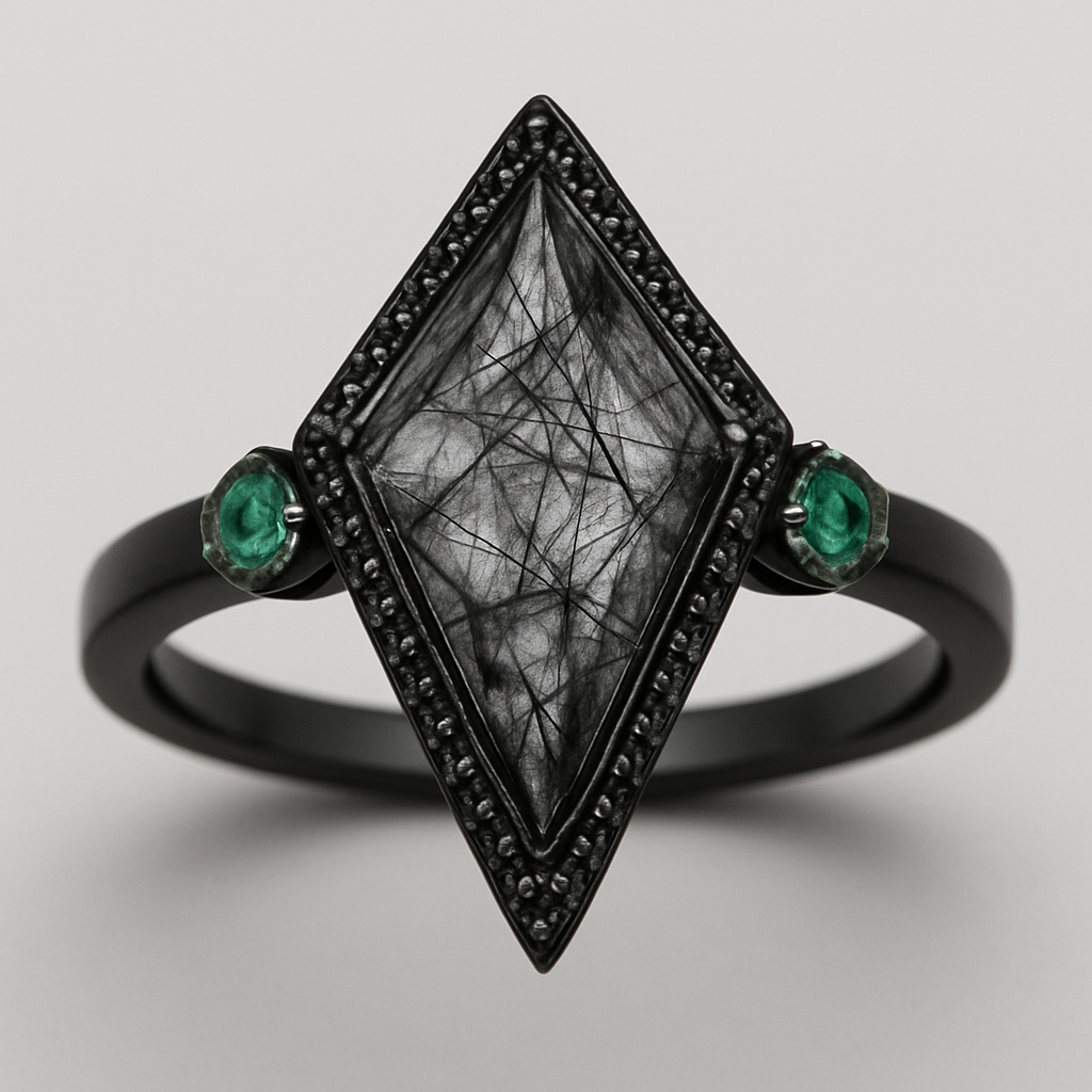 Black band, kite cut tourmalated quartz, emerald accent stones, second band black going around the kite stone with black stones