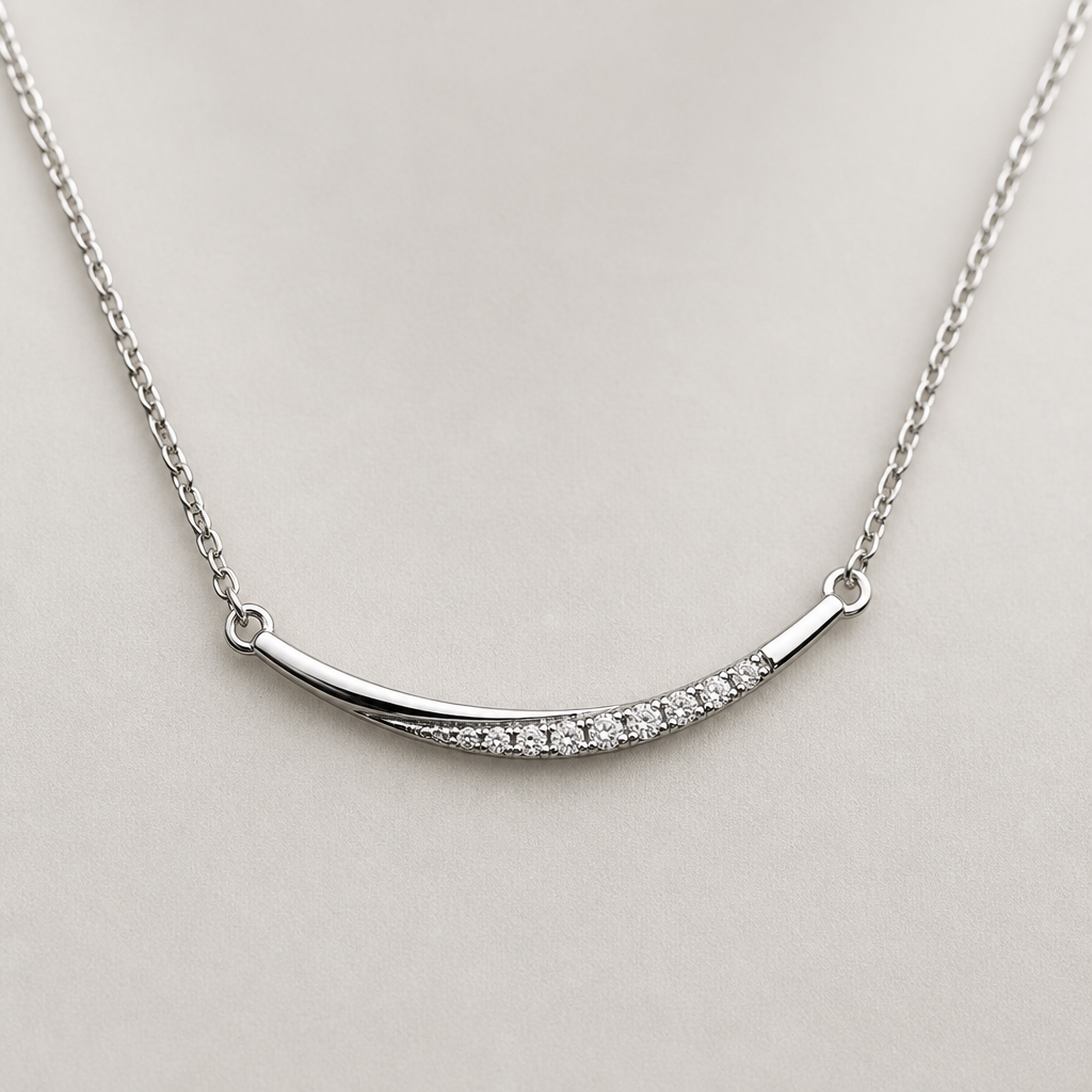 A women's necklace made of white gold suitable for daily wear
photorealistic jewelry design, A women's necklace made of white gold suitable for daily wear, modern style, just the design no text