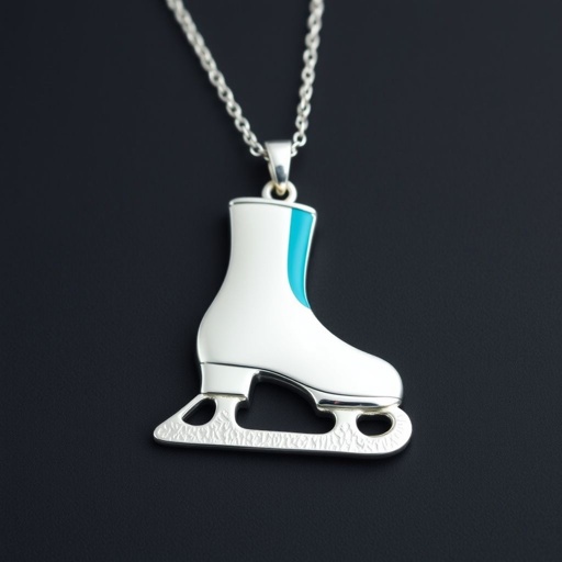 Silver Pendant shape one ice skate with turquoise stripe inside the low thin part blade