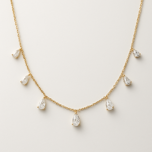 Pear shape pears station necklace 7 diamonds small each diamonds .15 no bezel