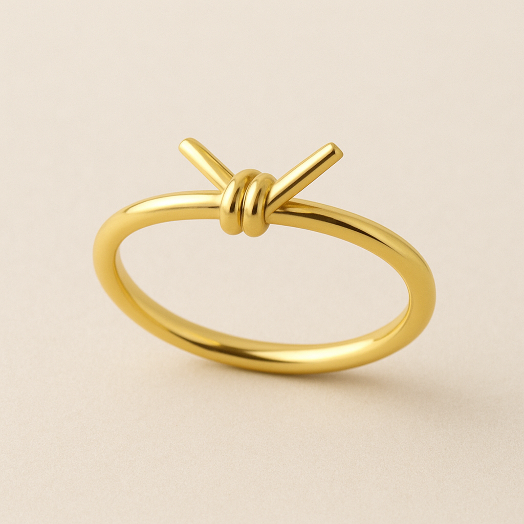 Yellow gold ring made to look like a bread twist tie