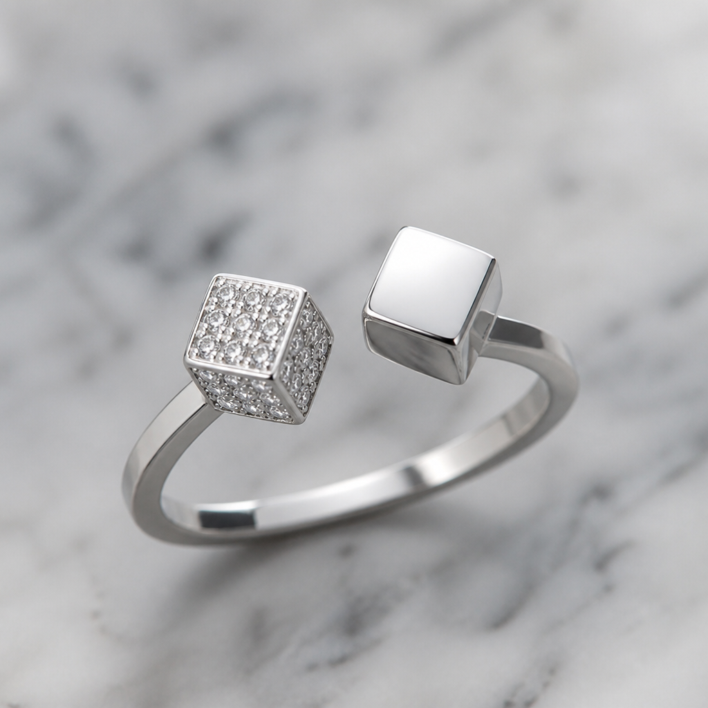 A geometric women's ring made of silver with diamond stones suitable for gift. double cube shape ring with one side cube plain diamond and one side cube shape body blank
photorealistic jewelry design, A geometric women's ring made of silver with diamond stones suitable for gift. double cube shape ring with one side cube plain diamond and one side cube shape body blank, geometric style, just the design no text