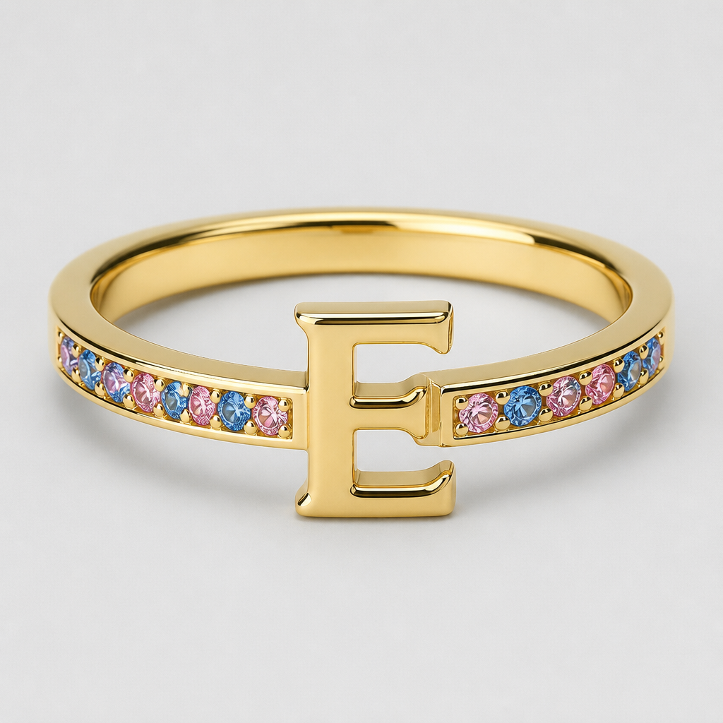 A modern women's ring made of gold suitable for birthday, ultra-minimalist, very simple and clean, understated, no embellishments. um anel de 15 anos com inicial E com pedrinhas azul e pedrinhas rosa em volta
photorealistic jewelry design, A modern women's ring made of gold suitable for birthday, ultra-minimalist, very simple and clean, understated, no embellishments. um anel de 15 anos com inicial E com pedrinhas azul e pedrinhas rosa em volta, modern style, just the design no text