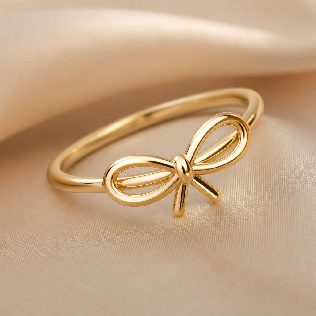A minimalist women's ring made of gold suitable for party. the ribbon design that tilted a little bit to the right and the ribbon design is very simple not to crowded design . between the loops inside the ribbon is empty. the ring is go around the ribbon not on top of the ring. the ribbon is more round and the tail of the ribbon is a little bit short . the ribbon is tie like a ribbon
photorealistic jewelry design, A minimalist women's ring made of gold suitable for party. the ribbon design that tilted a little bit to the right and the ribbon design is very simple not to crowded design . between the loops inside the ribbon is empty. the ring is go around the ribbon not on top of the ring. the ribbon is more round and the tail of the ribbon is a little bit short . the ribbon is tie like a ribbon, minimalist style, just the design no text