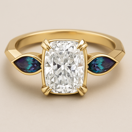 2 carat elongated cushion cut diamond engagement ring with double claw prongs in yellow gold ring with marquise shaped alexandrite side stones 