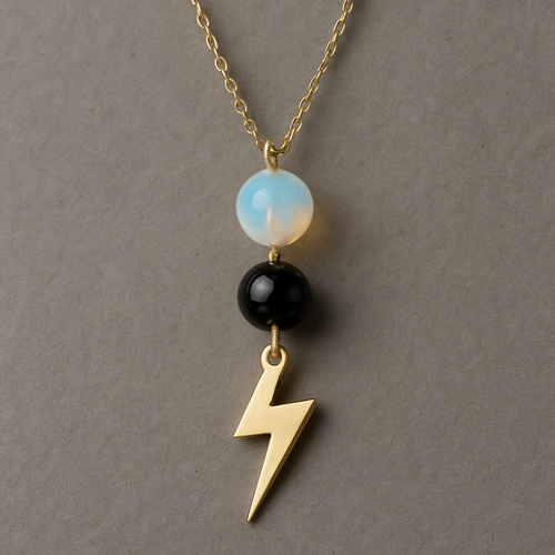 Opalite and onyx necklace with a gold lightening strike pendent