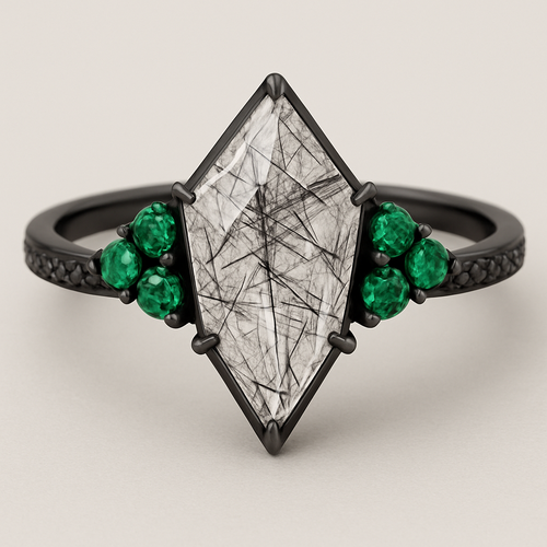 Black band, kite cut tourmalated quartz, emerald accent stones 3 on each side in a cluster, second band black going around the bottom of the kite stone with black stones