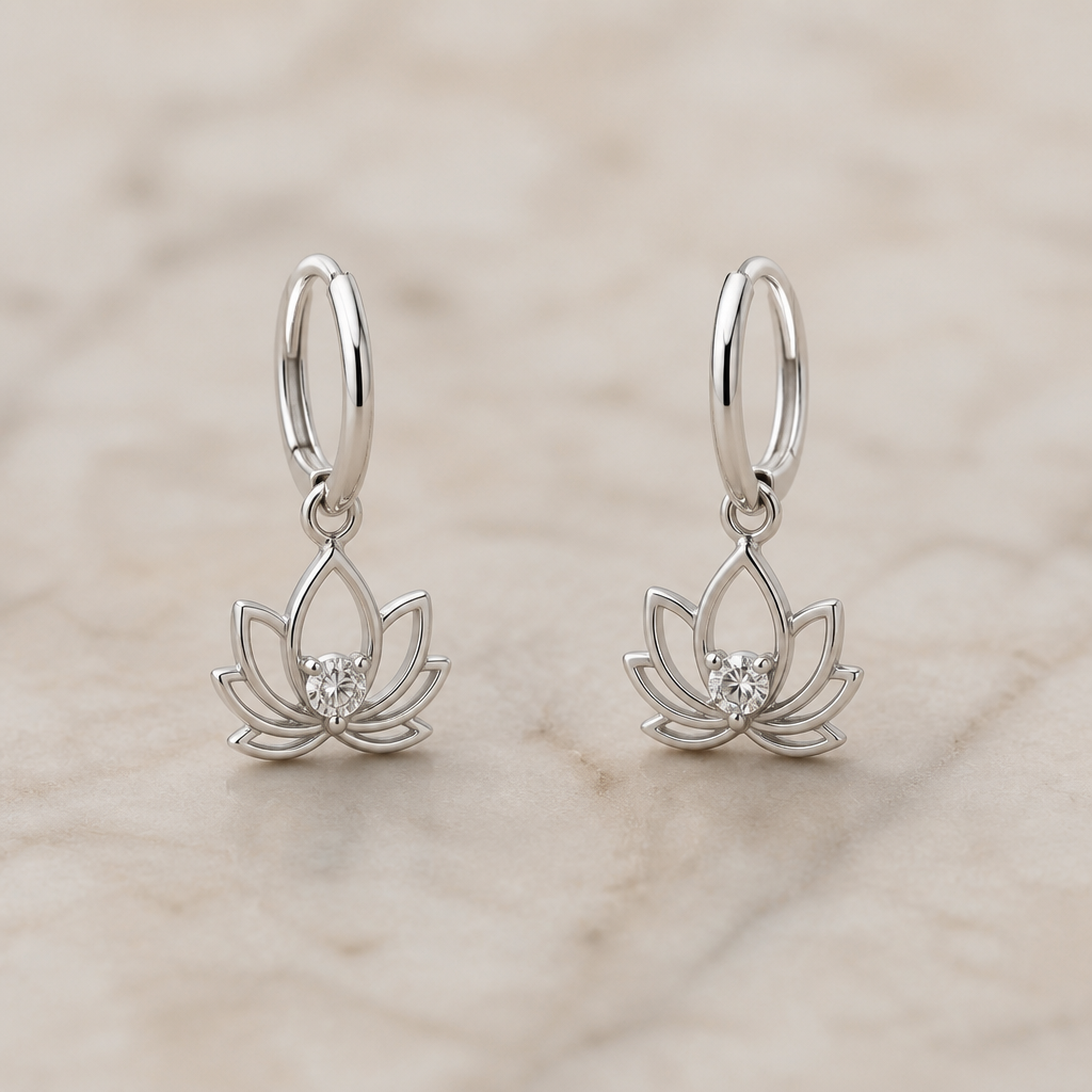 A minimalist women's earrings made of silver with diamond stones. minimaliste avec un beau lotus delicat avec 1 diamant dans le milieu super féminin, petit anneau
photorealistic jewelry design, A minimalist women's earrings made of silver with diamond stones. minimaliste avec un beau lotus delicat avec 1 diamant dans le milieu super féminin, petit anneau, minimalist style, just the design no text