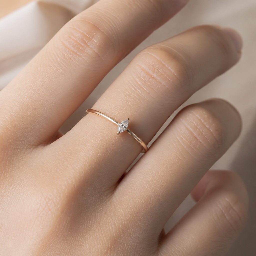 . Refinement: Soft and feminine, as if it’s gently resting on the finger.
photorealistic jewelry design, . Refinement: Soft and feminine, as if it’s gently resting on the finger., Minimalist style, just the design no text