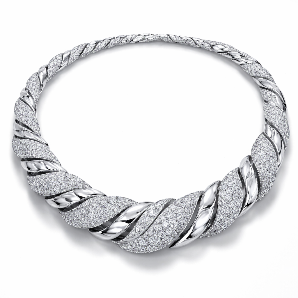 A necklace that is twisted and has diamonds and is made of separate pieces that links together