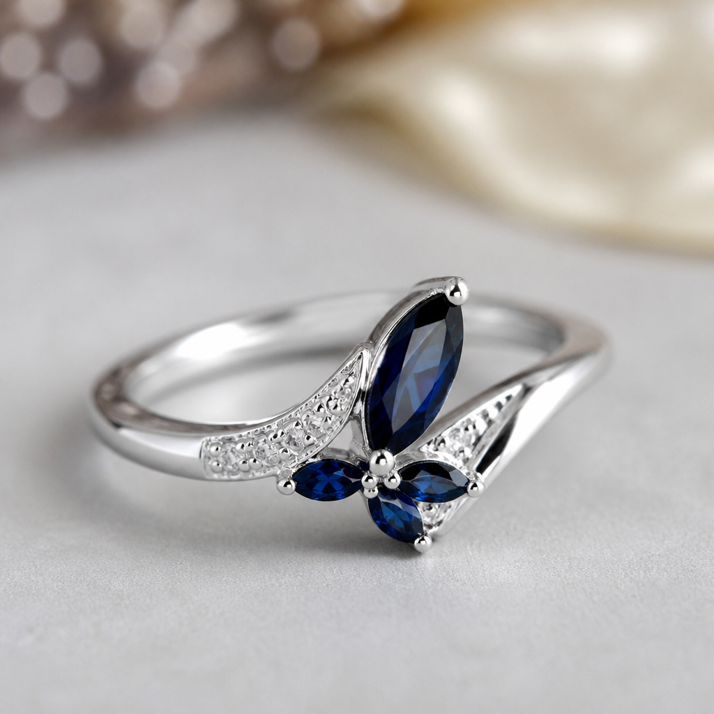 A luxury women's ring made of silver with sapphire stones suitable for daily wear
photorealistic jewelry design, A luxury women's ring made of silver with sapphire stones suitable for daily wear, luxury style, just the design no text