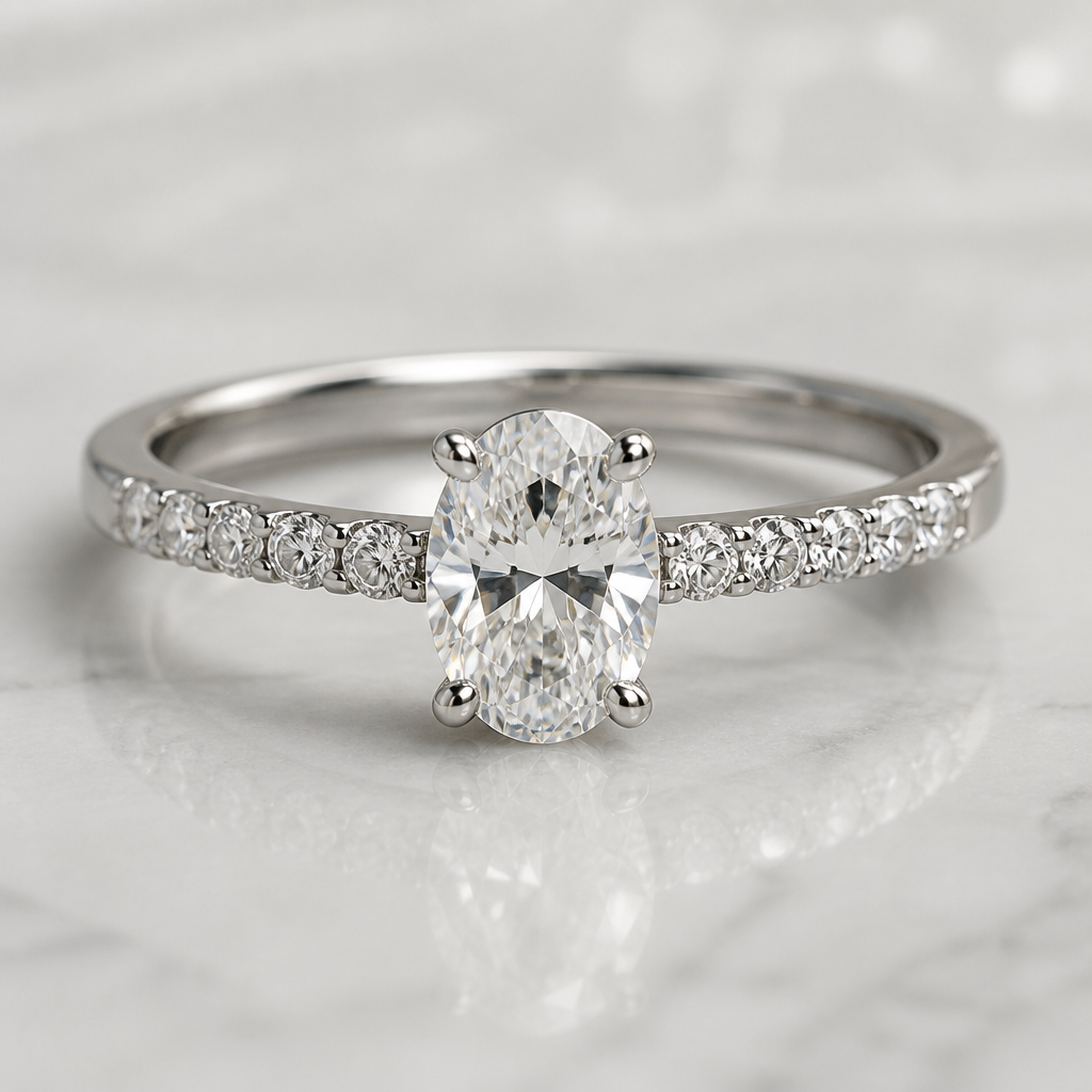 A contemporary women's ring made of white gold with diamond stones suitable for wedding, minimalist, simple and delicate, clean lines. A 0.70-carat oval diamond is used as the center stone.
photorealistic jewelry design, A contemporary women's ring made of white gold with diamond stones suitable for wedding, minimalist, simple and delicate, clean lines. A 0.70-carat oval diamond is used as the center stone., contemporary style, just the design no text