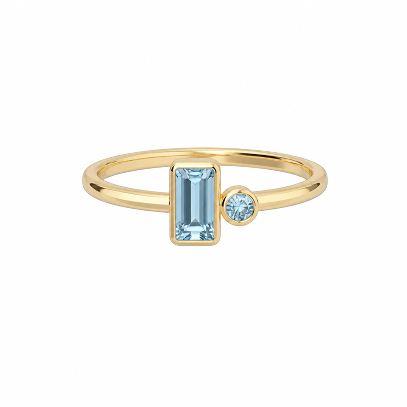 A modern women's ring made of gold with aquamarine stones suitable for gift, ultra-minimalist, very simple and clean, understated, no embellishments
using the attached image as a visual reference, create A modern women's ring made of gold with aquamarine stones suitable for gift, ultra-minimalist, very simple and clean, understated, no embellishments. photorealistic, just the design no text