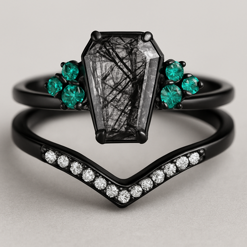 Black band, coffin cut rutilated black quartz, emerald accent stones 3 on each side in a cluster, add a wedding band that curves around main stone with black and white stones