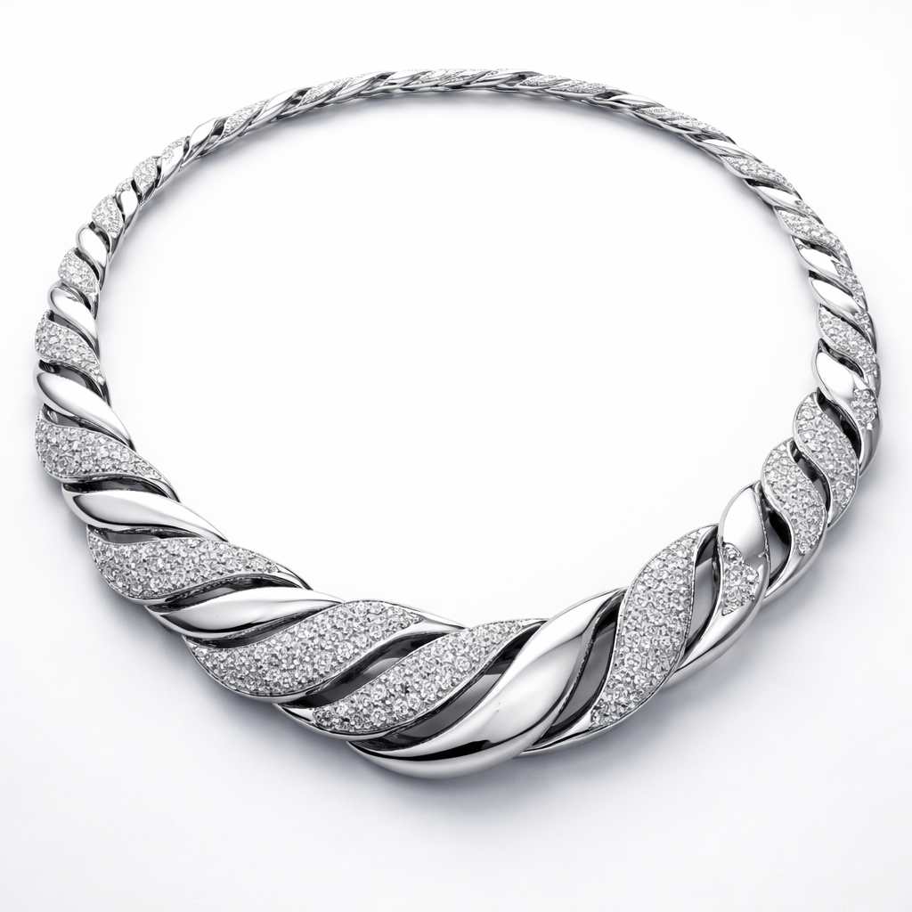 A necklace that is twisted and has diamonds and is made of separate pieces that links together