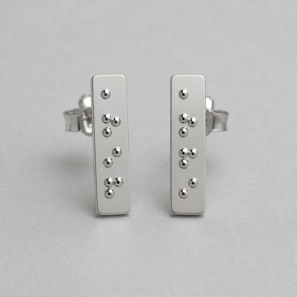 A minimalist women's earrings made of silver. ohrstecker aus Silber
oberfläche rechteckig flach
Auf der Fläche silberne Kugeln in koreanischer braille Schrift
braille schrift kugeln von oben nach unten angerichtet mit der Bedeutung 사랑해
die kugeln sind erhaben und ertastbar für blinde menschen
photorealistic jewelry design, A minimalist women's earrings made of silver. ohrstecker aus Silber
oberfläche rechteckig flach
Auf der Fläche silberne Kugeln in koreanischer braille Schrift
braille schrift kugeln von oben nach unten angerichtet mit der Bedeutung 사랑해
die kugeln sind erhaben und ertastbar für blinde menschen, minimalist style, just the design no text