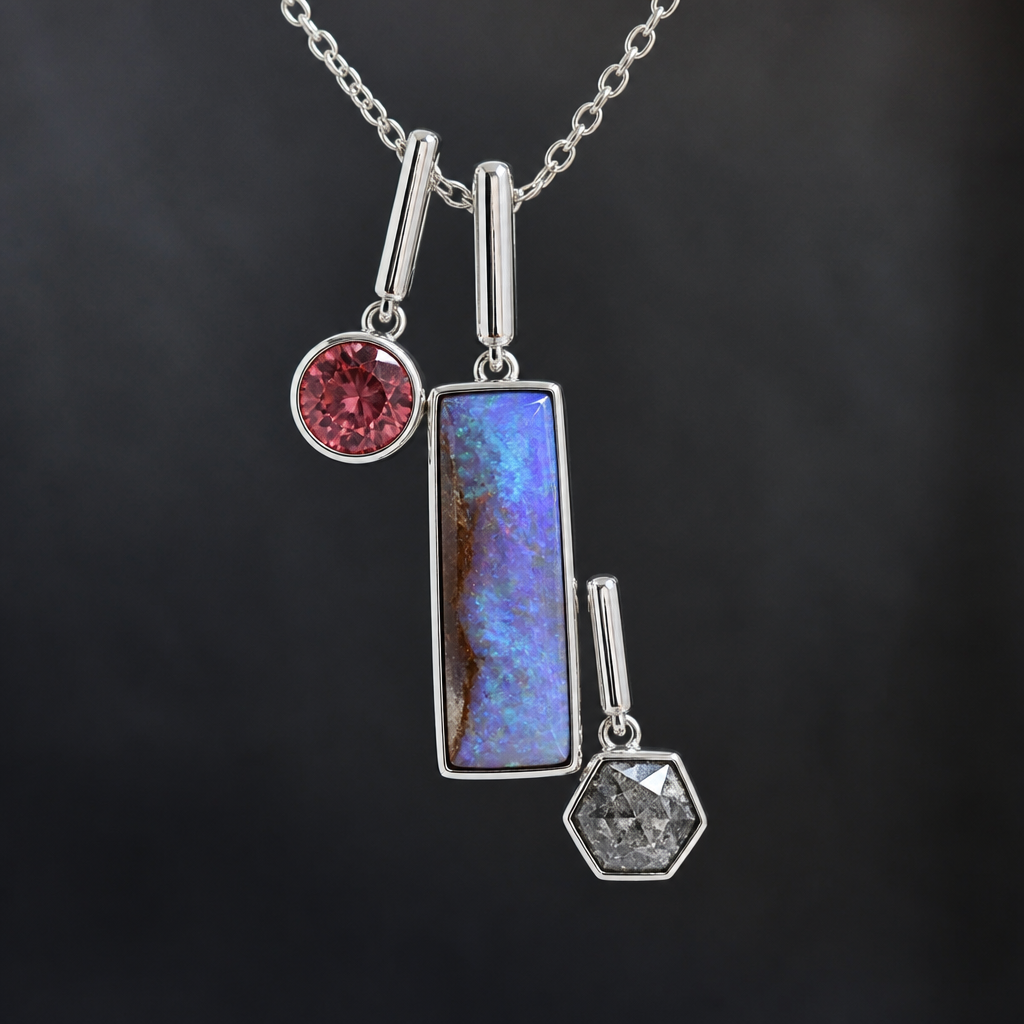 5mm round red beryl, rectangle boulder opal, 5mm hexagon salt and pepper diamond pendant sideways using tube bail separately on each stone at different lengths
photorealistic jewelry design, 5mm round red beryl, rectangle boulder opal, 5mm hexagon salt and pepper diamond pendant sideways using tube bail separately on each stone at different lengths, modern style, just the design no text