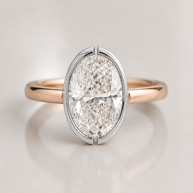 platinum color split bezel on north south of the stone
edit the attached jewelry design with these instructions: platinum color split bezel on north south of the stone. keep it photorealistic, just the design no text