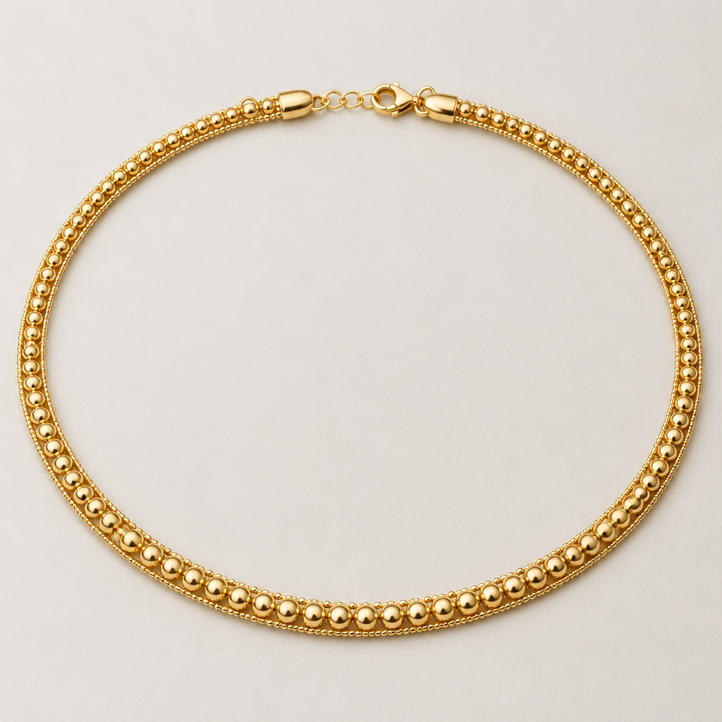 A women's necklace made of gold. 1mm golden beads and 0mm golden beads single thushi design