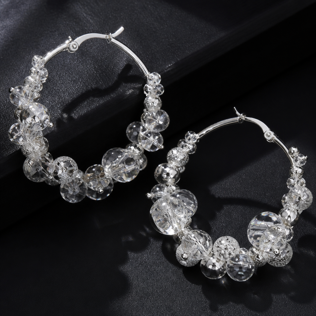 A luxury women's earrings made of silver. hoop earrings with different types of beads and crystals
photorealistic jewelry design, A luxury women's earrings made of silver. hoop earrings with different types of beads and crystals, luxury style, just the design no text
