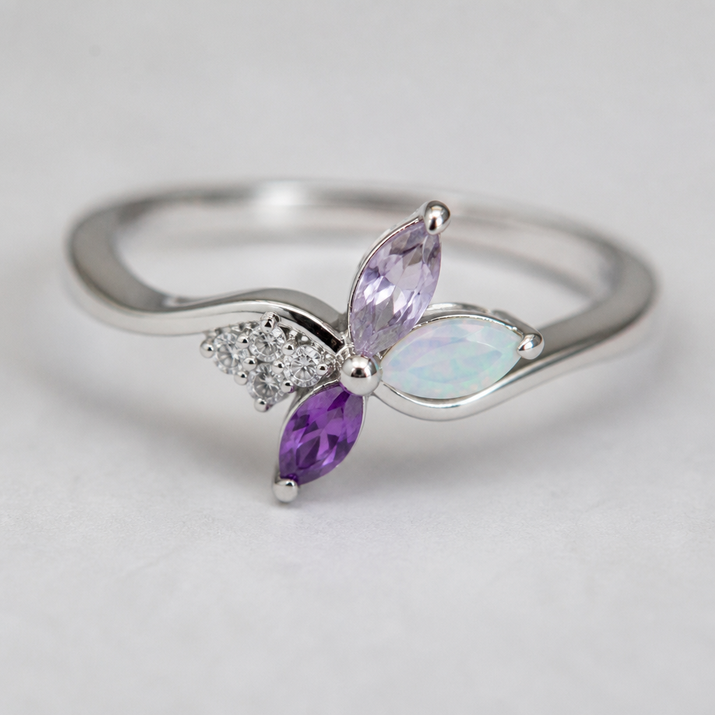 A minimalist women's ring made of silver with diamond and amethyst and opal stones. Blumen inspiriert
photorealistic jewelry design, A minimalist women's ring made of silver with diamond and amethyst and opal stones. Blumen inspiriert, minimalist style, just the design no text