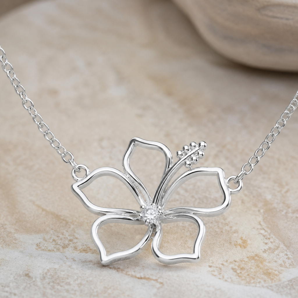 A women's necklace made of silver. hibicus vu de coté ligne fine et delicat ,diamand dans le milieu, interieur de la fleur vide, plus detail, 5 petales chaine de chaque coté, exotique style qui fait pensé à hawaî, plus naturel
photorealistic jewelry design, A women's necklace made of silver. hibicus vu de coté ligne fine et delicat ,diamand dans le milieu, interieur de la fleur vide, plus detail, 5 petales chaine de chaque coté, exotique style qui fait pensé à hawaî, plus naturel, modern style, just the design no text