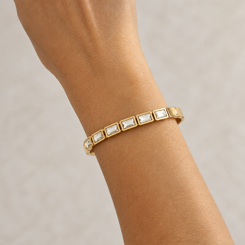 A women's bracelet. coloque essa peça na modelo
using the attached image as a visual reference, create A women's bracelet. coloque essa peça na modelo. photorealistic, just the design no text