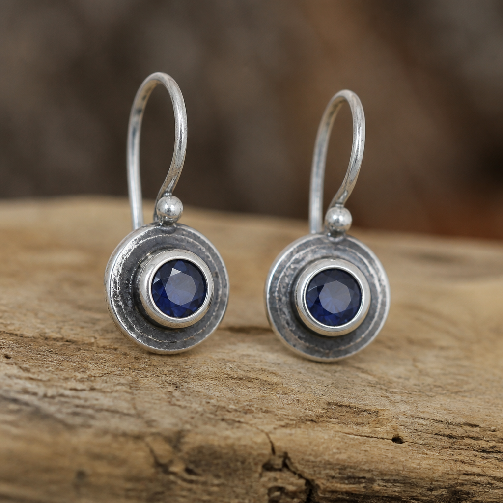 A rustic women's earrings made of silver with sapphire stones suitable for daily wear
photorealistic jewelry design, A rustic women's earrings made of silver with sapphire stones suitable for daily wear, rustic style, just the design no text