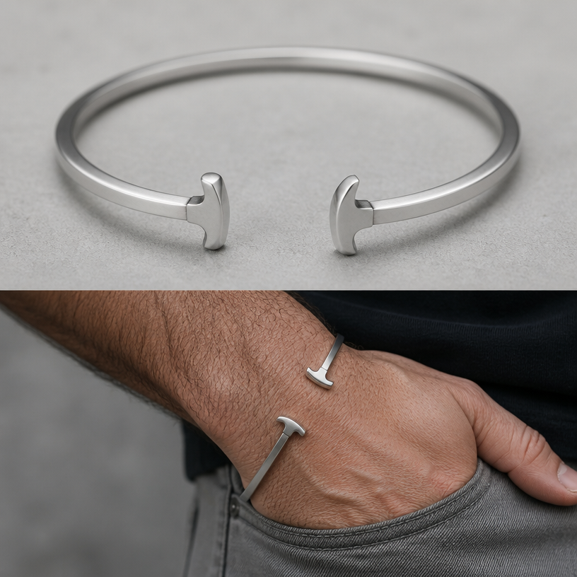 A women's bracelet made of silver. Generate an image of on man's hand cuff that is 3mm square and both ends looks like this hammer looking in the opposite directions
using the attached image as a visual reference, create A women's bracelet made of silver. Generate an image of on man's hand cuff that is 3mm square and both ends looks like this hammer looking in the opposite directions. photorealistic, just the design no text