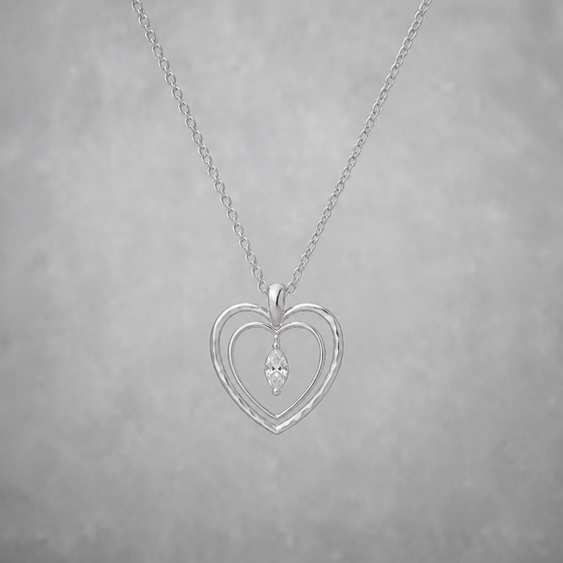 les coeurs exterieurs mateler de facon moderne
edit the attached jewelry design with these instructions: les coeurs exterieurs mateler de facon moderne. keep it photorealistic, just the design no text