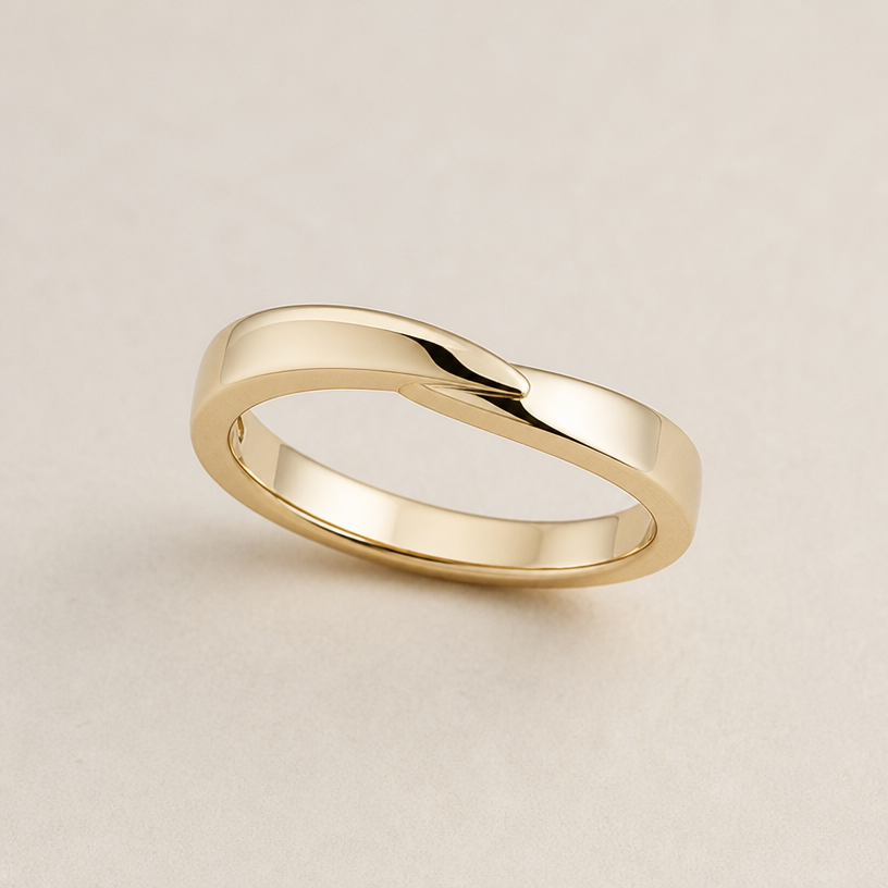 A minimalist women's ring made of gold
using the attached image as a visual reference, create A minimalist women's ring made of gold. photorealistic, just the design no text