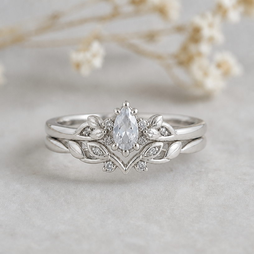 try to connect the main stone of the upper ring and the v form of the lower ring more so that there‘s less space in between
edit the attached jewelry design with these instructions: try to connect the main stone of the upper ring and the v form of the lower ring more so that there‘s less space in between. keep it photorealistic, just the design no text